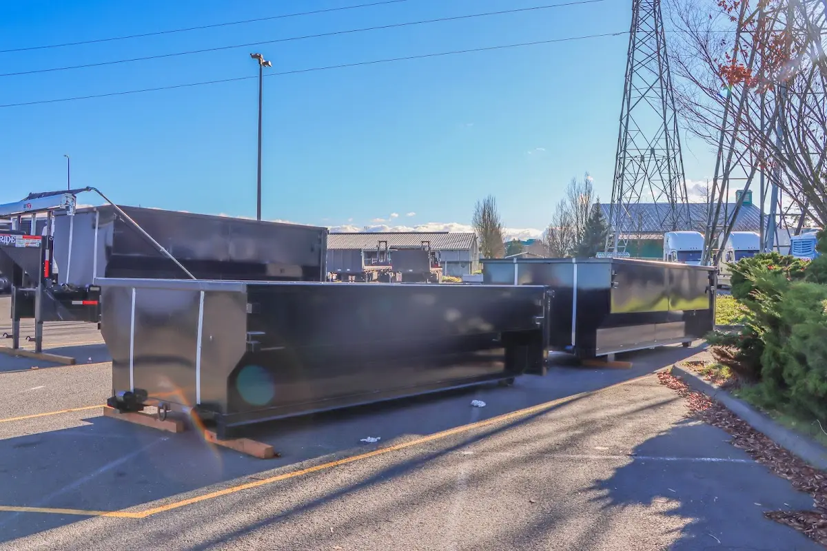 Roll-off dumpster ready for waste disposal at job site for Construction Dumpster Rental in Clute